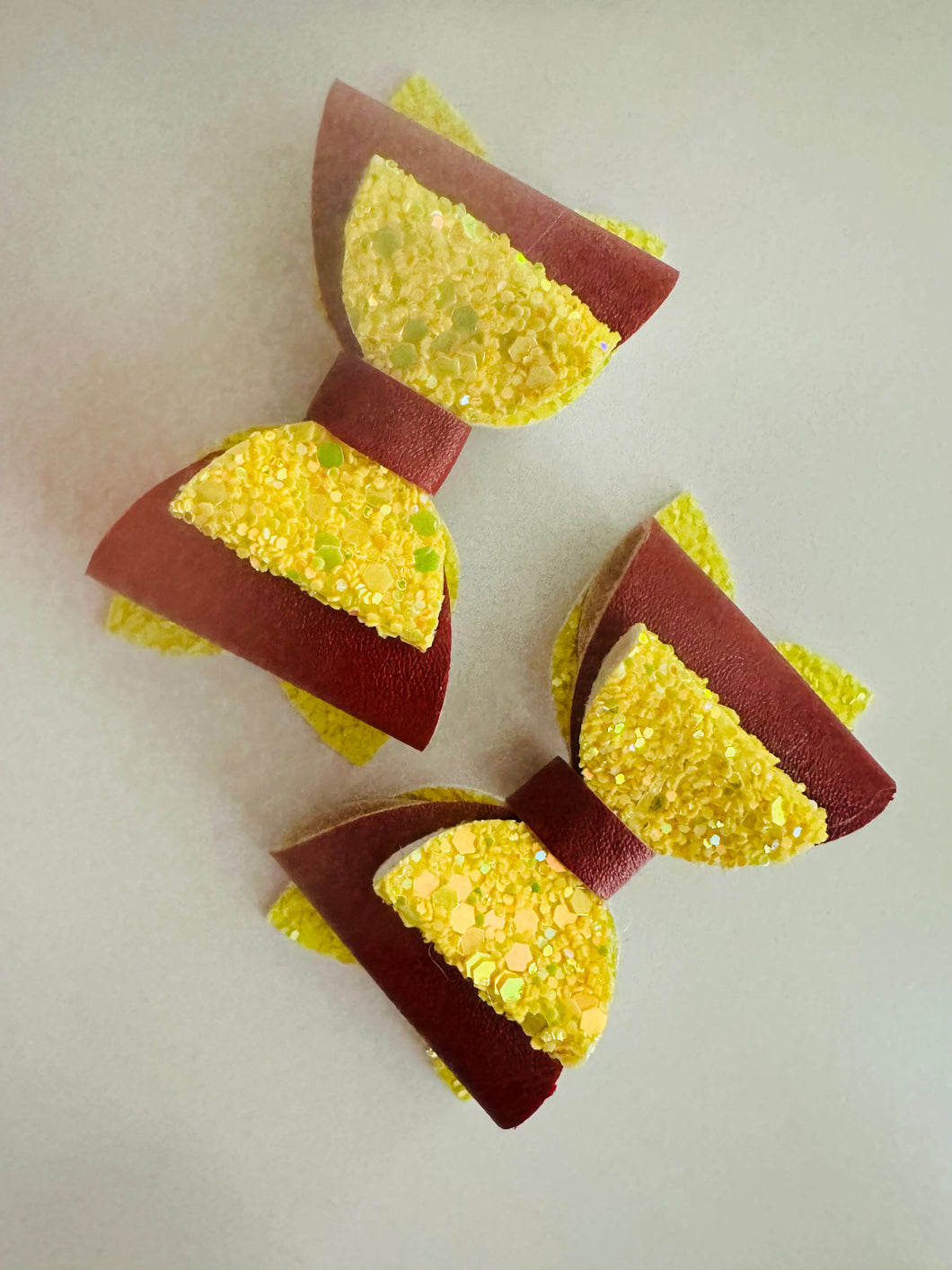 School maroon and yellow piggy bows X2