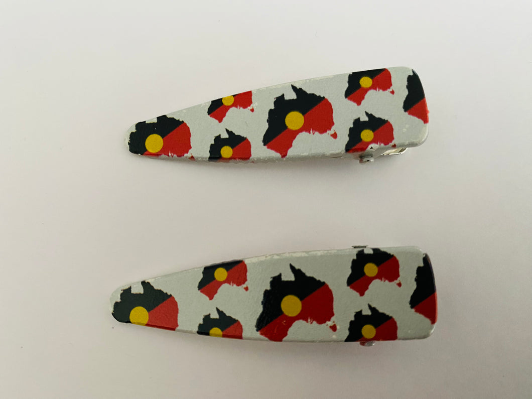 Naidoc pair of metal clips